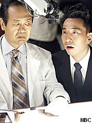 Image of Ando and a scientist from 'Heroes'