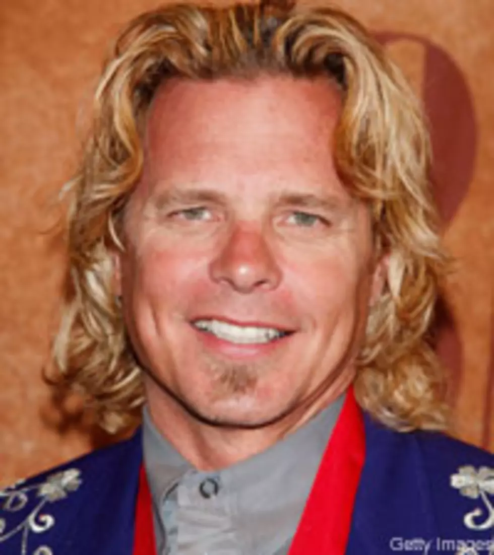 Jeffrey Steele Skates for His Son