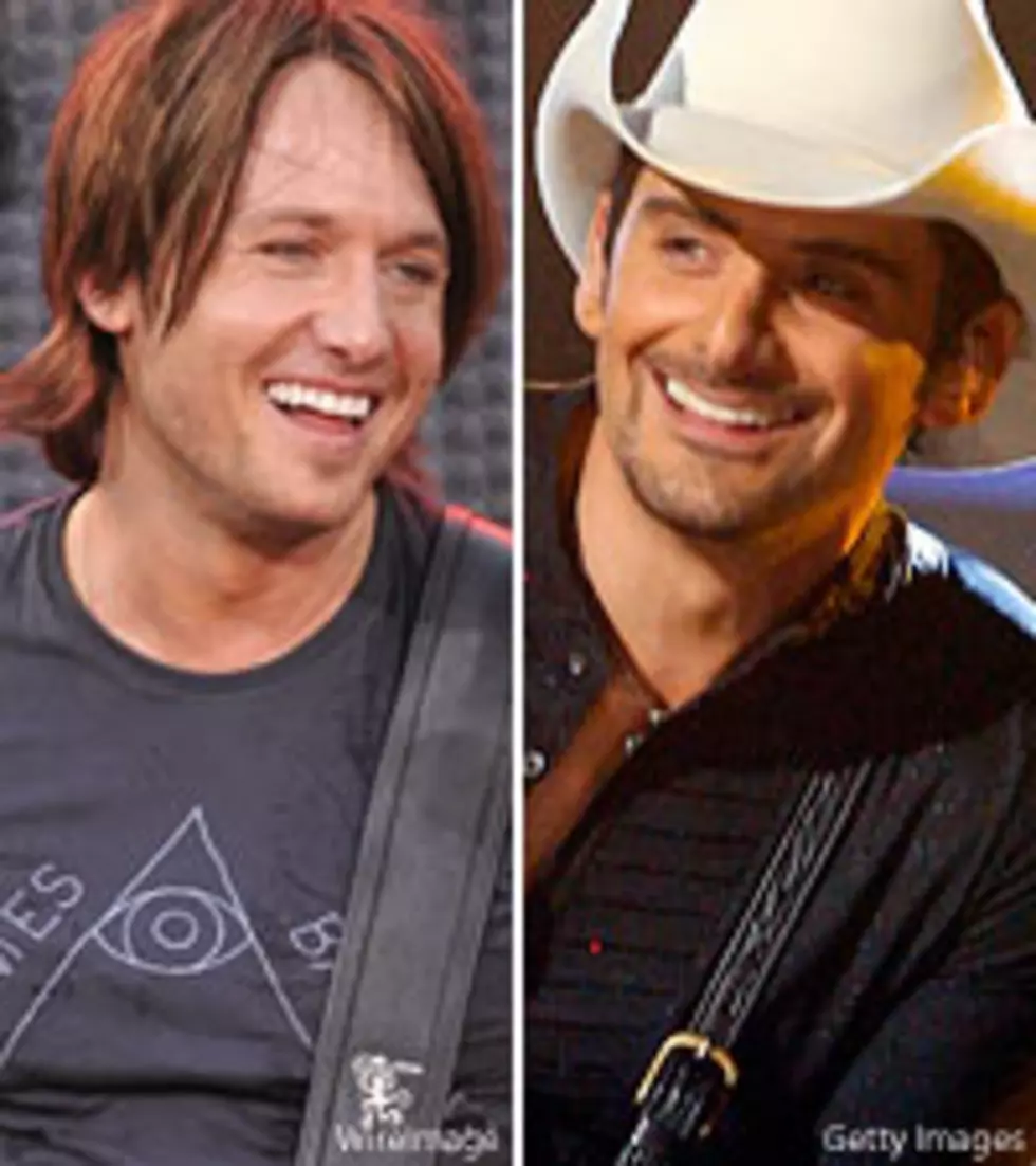 Brad Paisley and Keith Urban Play Guitar in the Loo