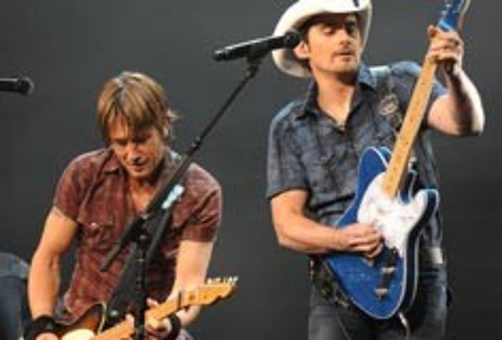 Keith Urban, Brad Paisley + More Donate Flood-Damaged Guitars