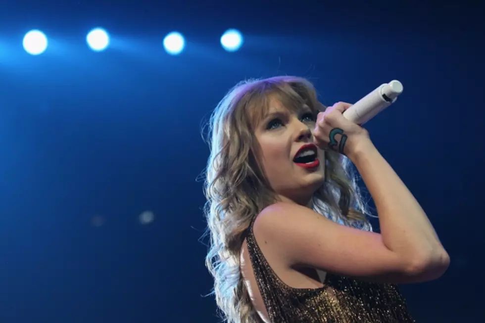 Fan Rushes Taylor Swift Onstage in London