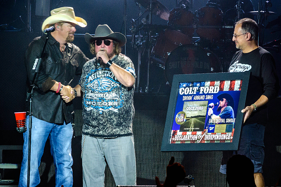 Toby Keith Surprises Colt Ford on Stage with Gold Plaque