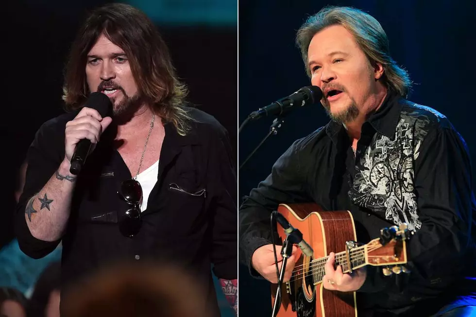 Learn the Story Behind Travis Tritt + Billy Ray Cyrus’ Feud