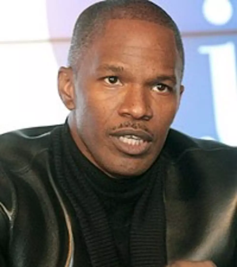 Jamie Foxx Dukes It Out at Usher Pre-Grammy Concert