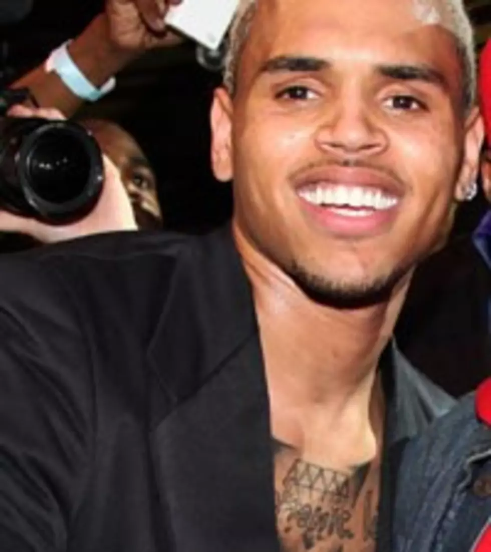 Chris Brown Bowls With Youth in Australia for Charity