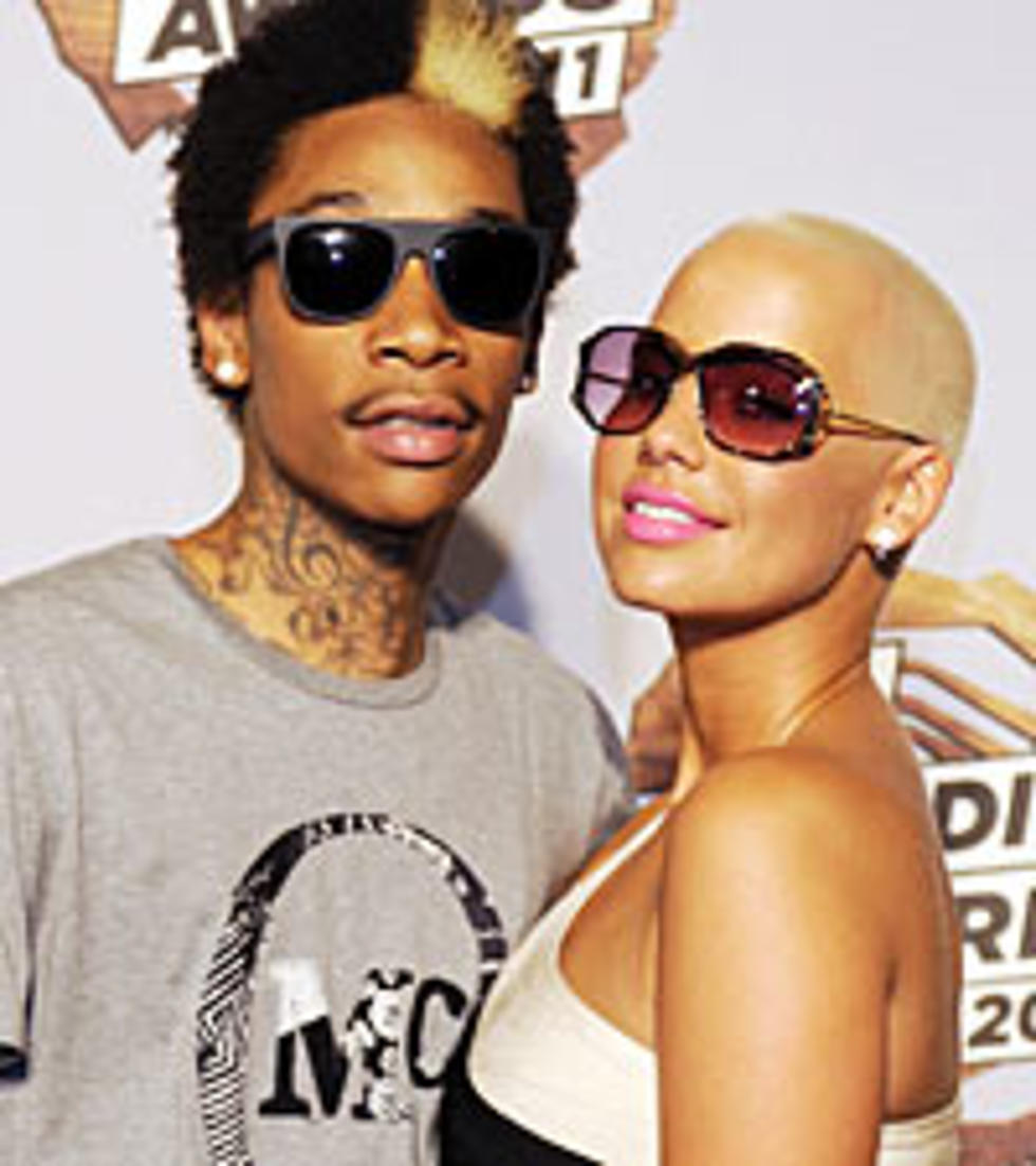 Wiz Khalifa Licks Amber Rose On Stage, She Tattoos His Name