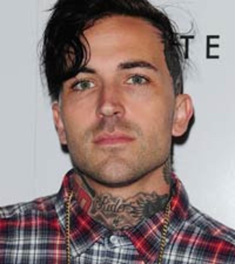 Yelawolf Punches Fan After Being Knocked Down &#8212; Video