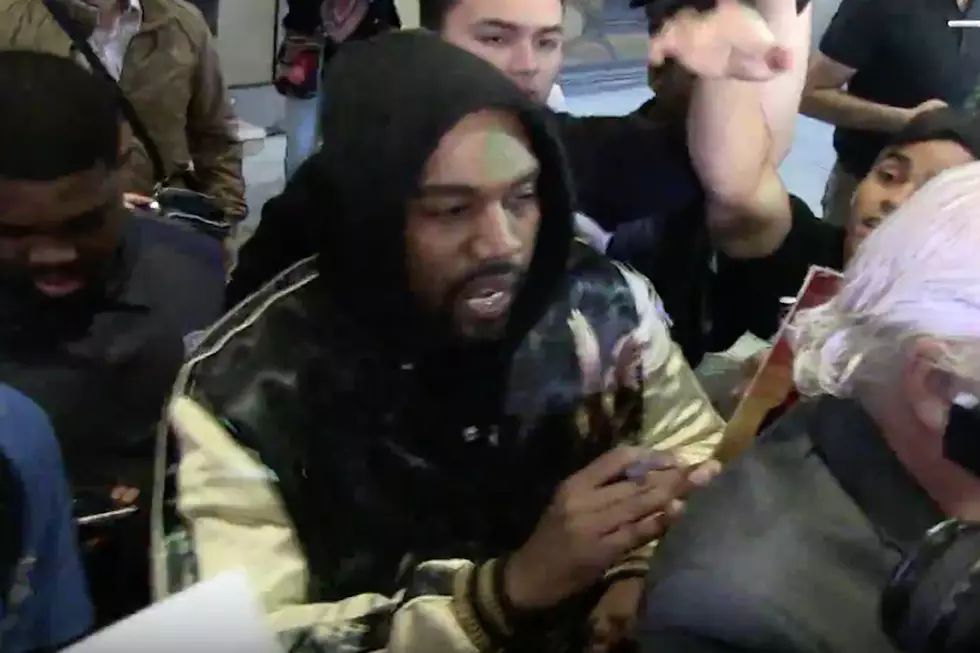 Kanye West Breaks Up Crazy Paparazzi Fight at LAX [VIDEO]