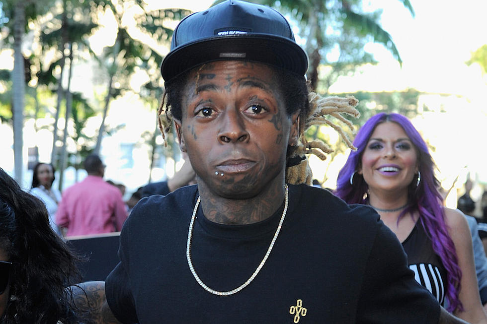 Lil Wayne’s Crew Roughs Up a Guy After He Rushes Onstage [WATCH]