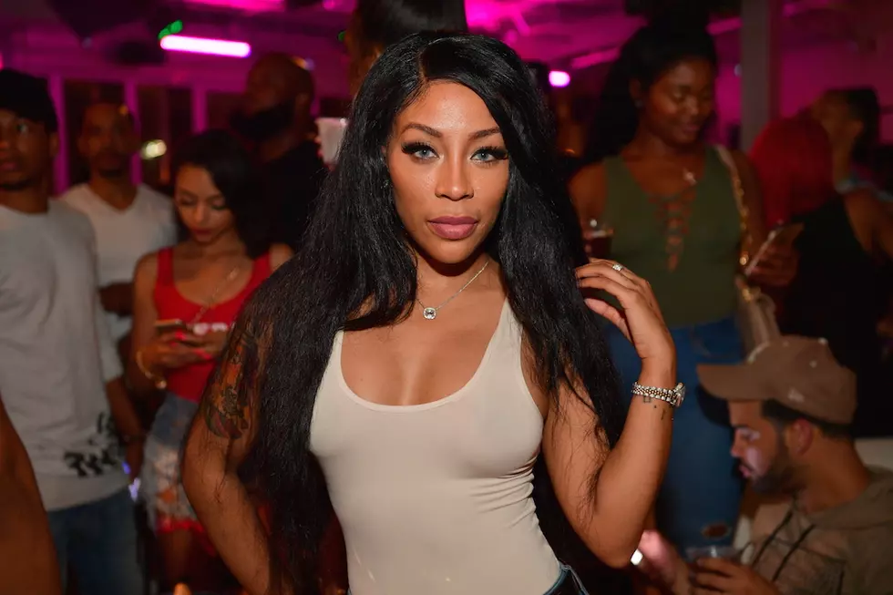 K. Michelle Is Happy–So She Ran Topless Thru the Atlantic Records Office [VIDEO]