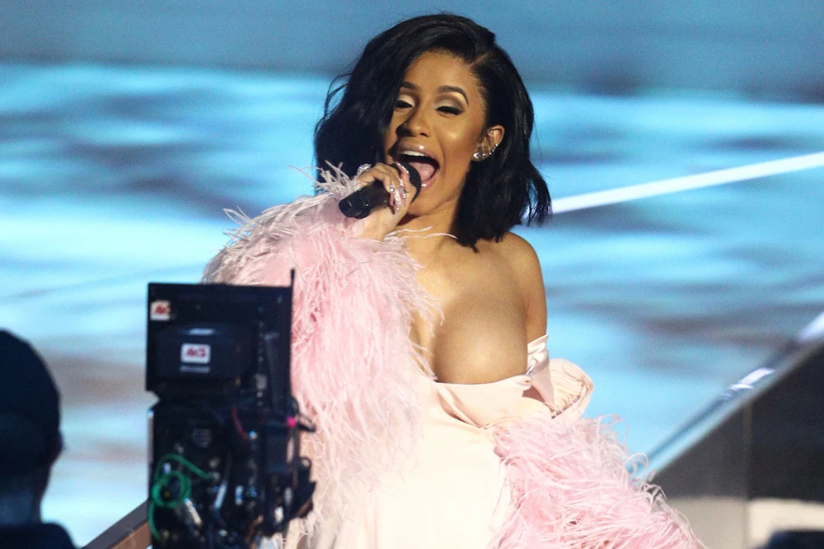 Cardi B gave the cameraman something to sweat about at the awards show. car...