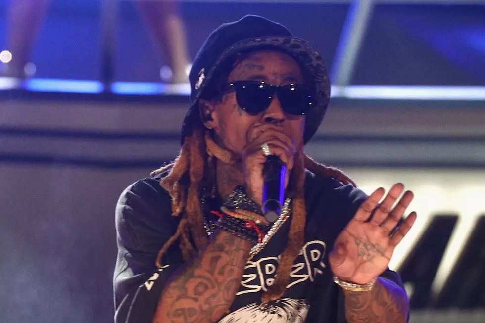 Lil Wayne Tells Australian Crowd His Crew &#8216;Got Pistols&#8217; After a Bottle Was Thrown Onstage