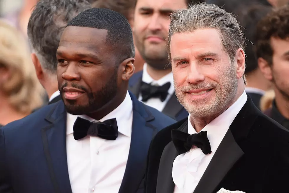 Watch John Travolta Dance With 50 Cent at Cannes [VIDEO]