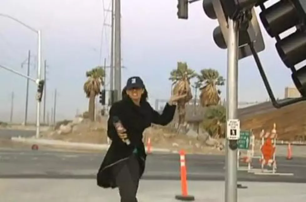 Great Moments in Broadcasting: Reporter Marissa Mike Does Take After Take in High Winds and Ill-Fitting Cap [VIDEO]
