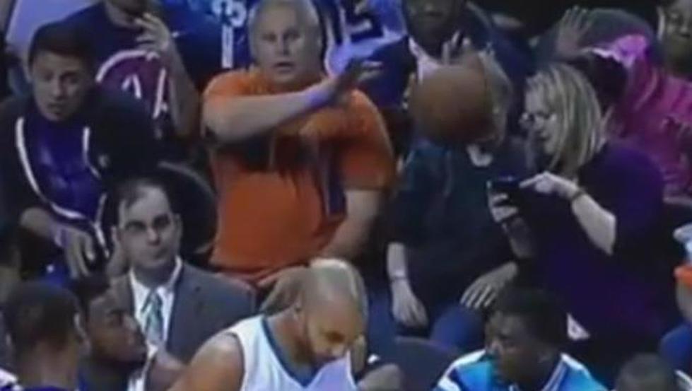Woman Staring at Cell Phone Takes Basketball to the Face – See the Video