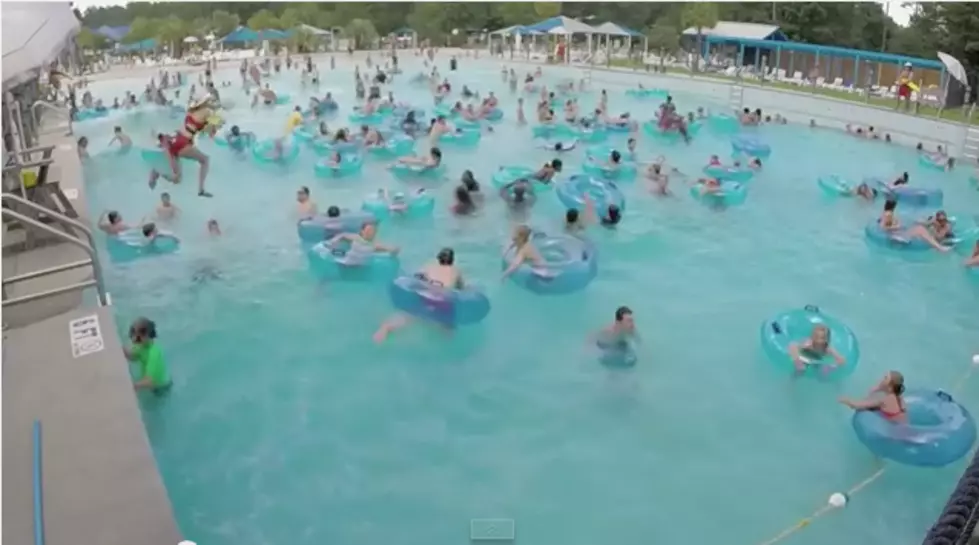 Lifeguard Makes an Incredibly Swift Rescue in a Packed Pool 