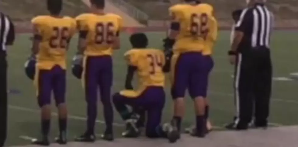 Burges High School Football Player Takes A Knee In Protest During National Anthem