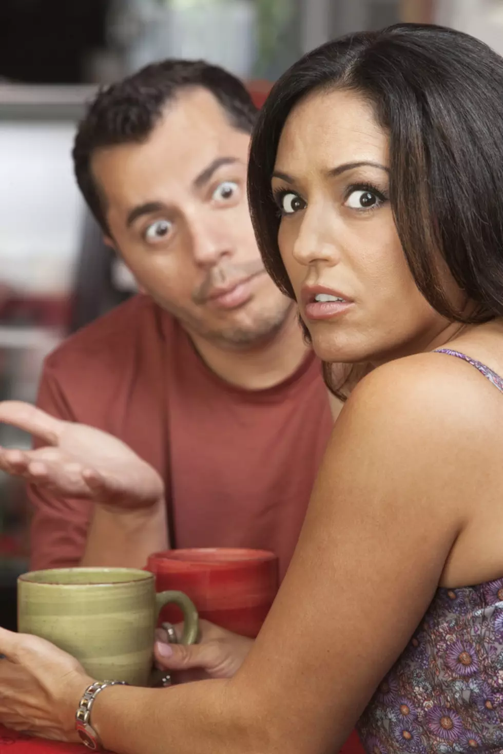 Couple Arguing in Cafe