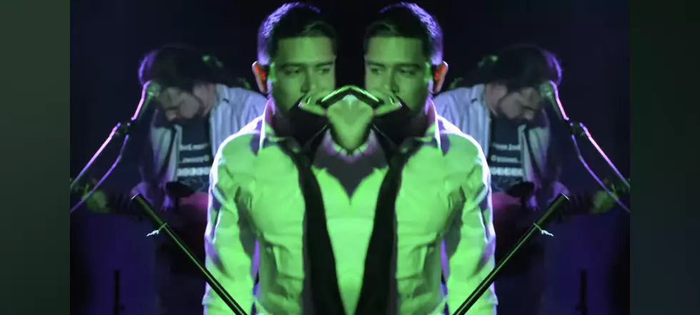 Ribo-Flavin frontman, Rebel Agnostic, performing
