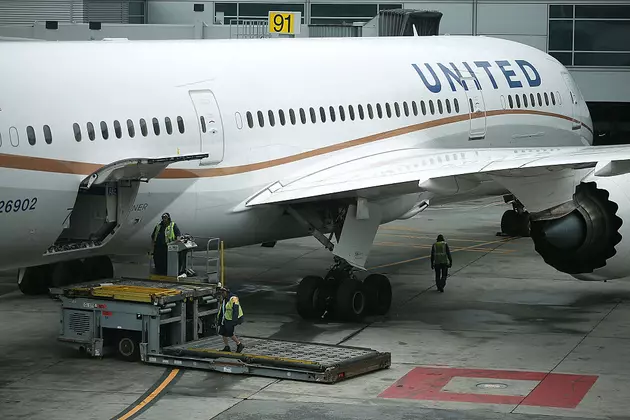 United Airlines Drags Doctor Off Plane to Take Seat for Staff