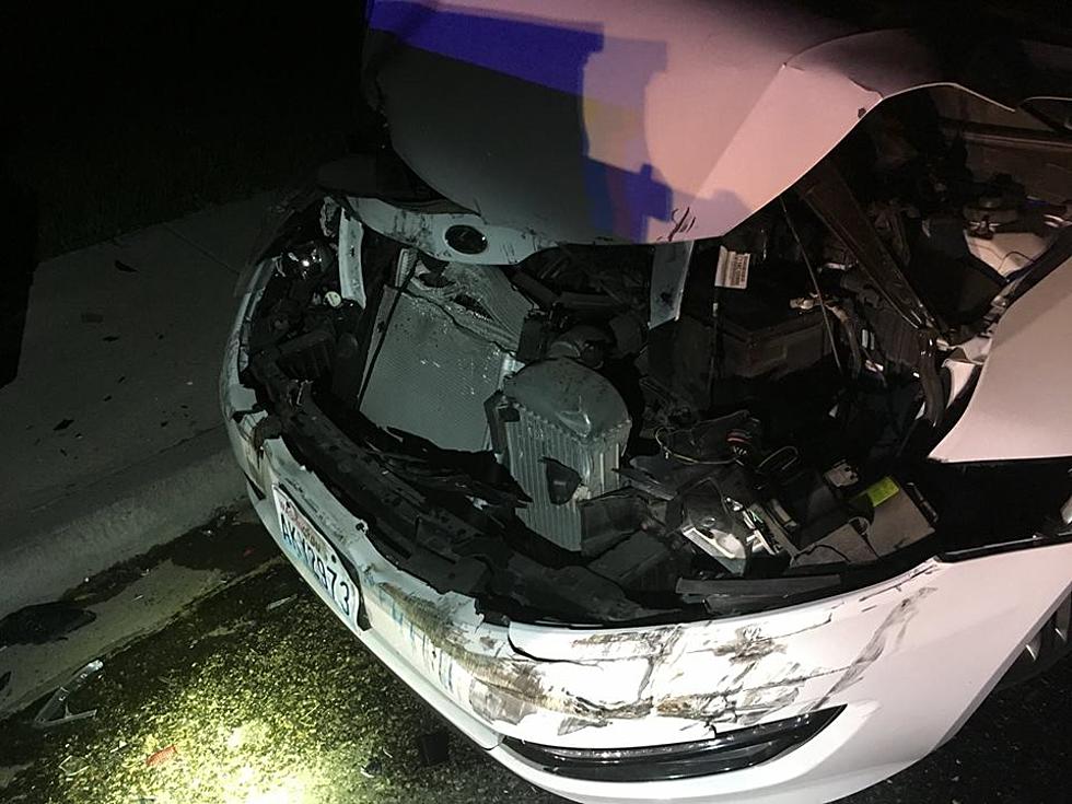 DUI Driver Hits 2 Parked Cars, Lands on Top in Middle of Street
