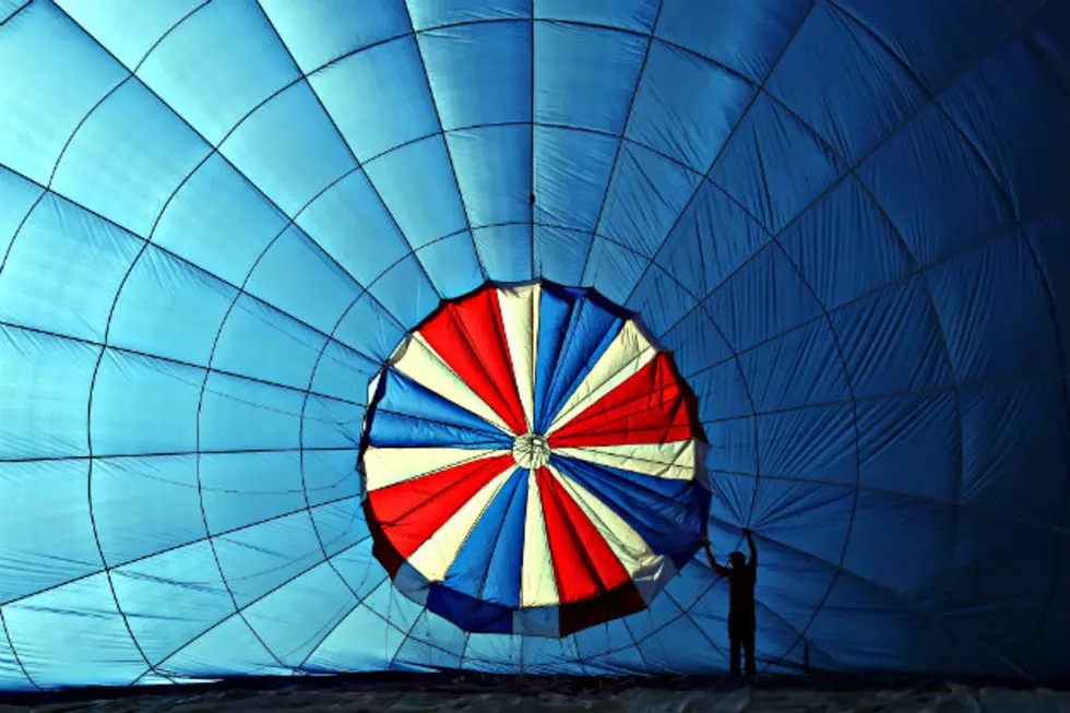 Walking A Tightrope Between Hot Air Balloons Looks Like Fun [VIDEO]
