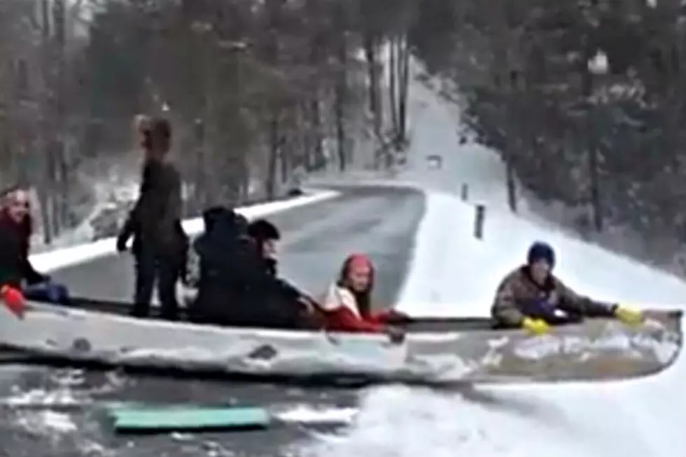 Children Enjoy Some Winter Fun With A Canoe [VIDEO]
