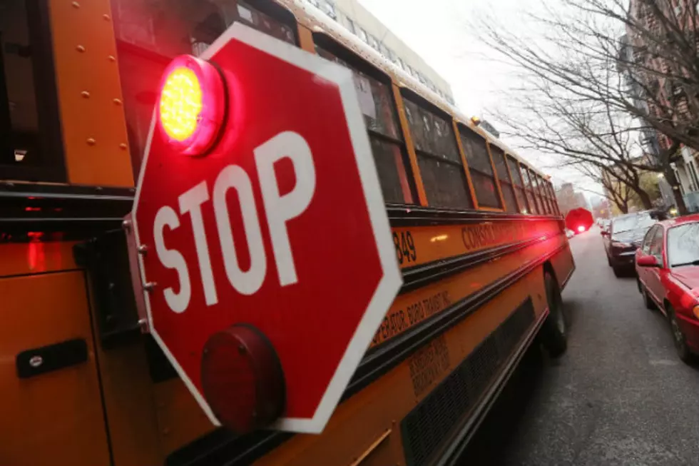 Watch a Semi Illegally Pass a Stopped School Bus on Highway 23 [VIDEO]