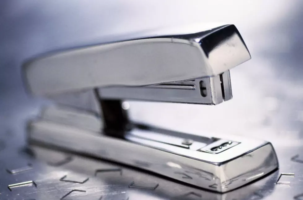 Close-up of staples near a stapler