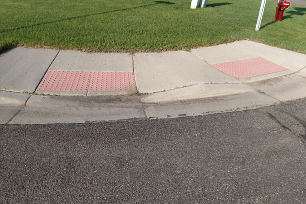 Do You Know What Those Raised Dots on Sidewalks Are For?