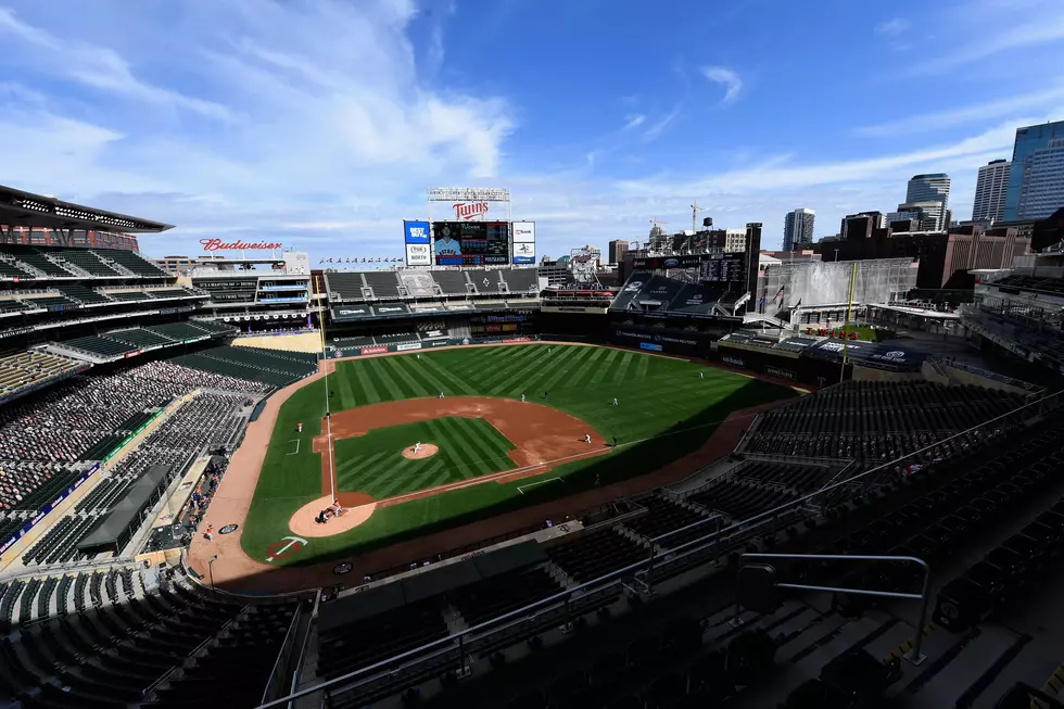 Signs Pointing to Fans at Twins Home Opener