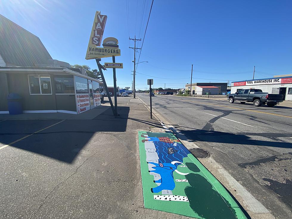 New Sidewalk Mural Painted in Front of Val&#8217;s in St. Cloud