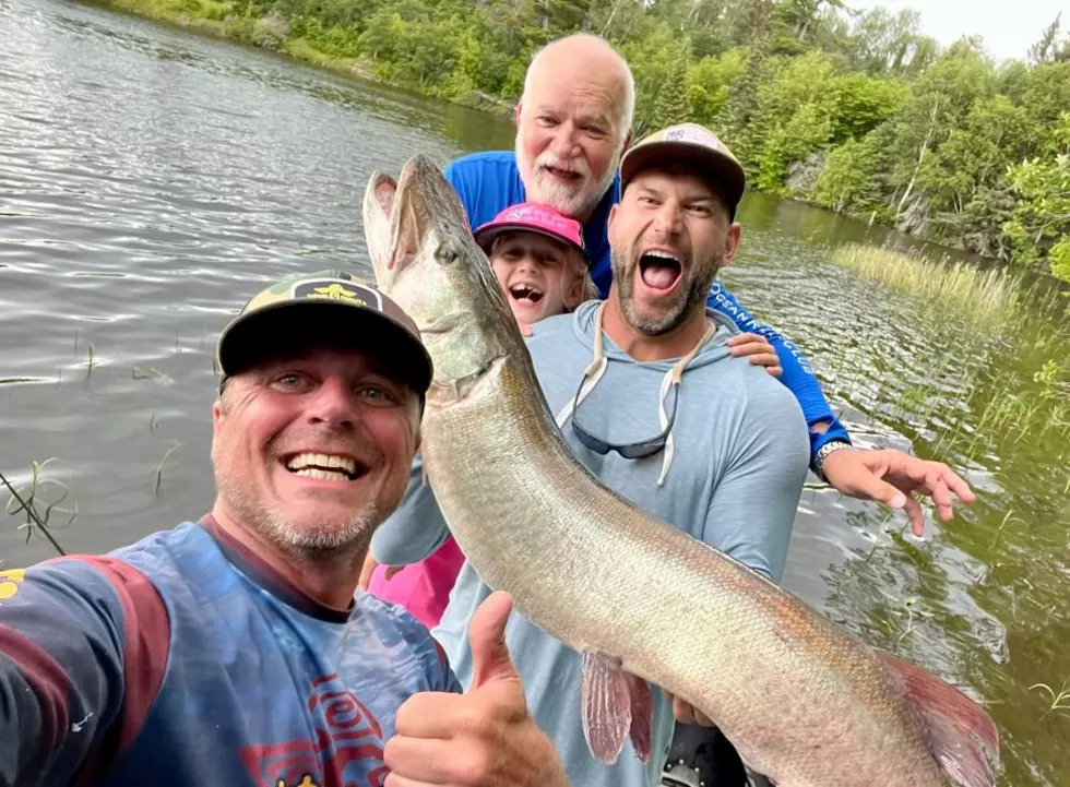 Watch The Daughter Of A Former NFL Player Catch A HUGE MN Fish! 