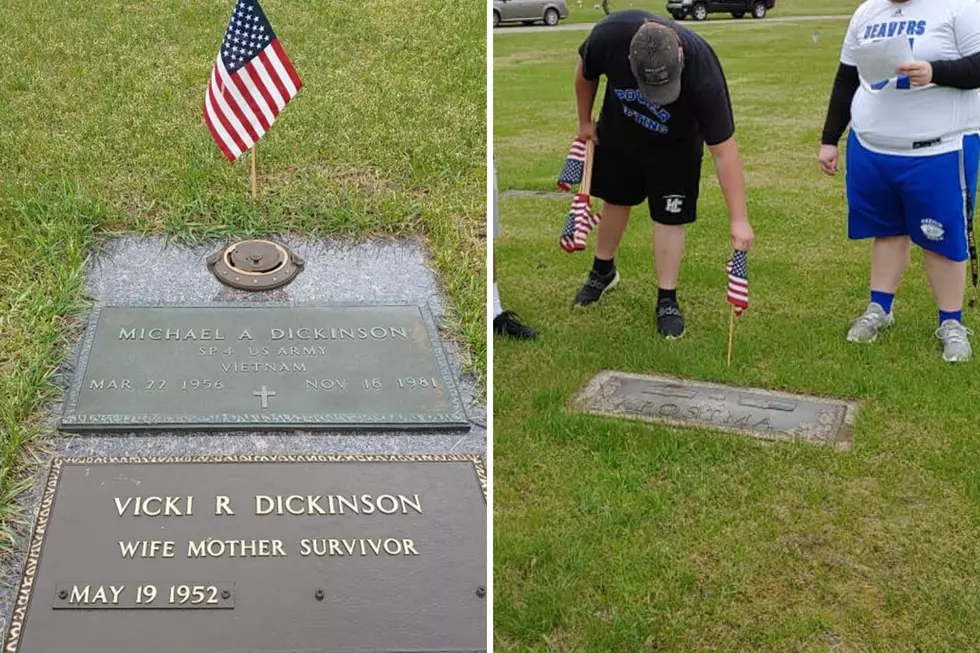 Battle Creek High School Students Put Flags On Military Grave Sites