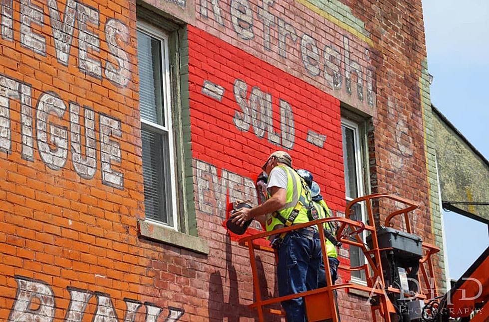Work to Restore the Iconic Albion Coca-Cola Mural has Begun