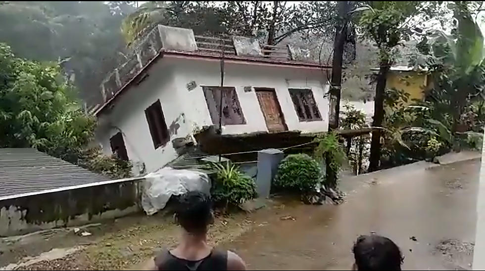 Have You Ever Seen An Entire House Slide Into A River? 