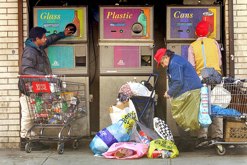 How Many Bottles And Cans Are Returned For Their Deposit Each Day In Michigan?