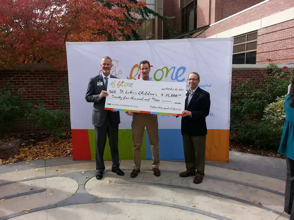 FitOne Presents Check to St. Lukes