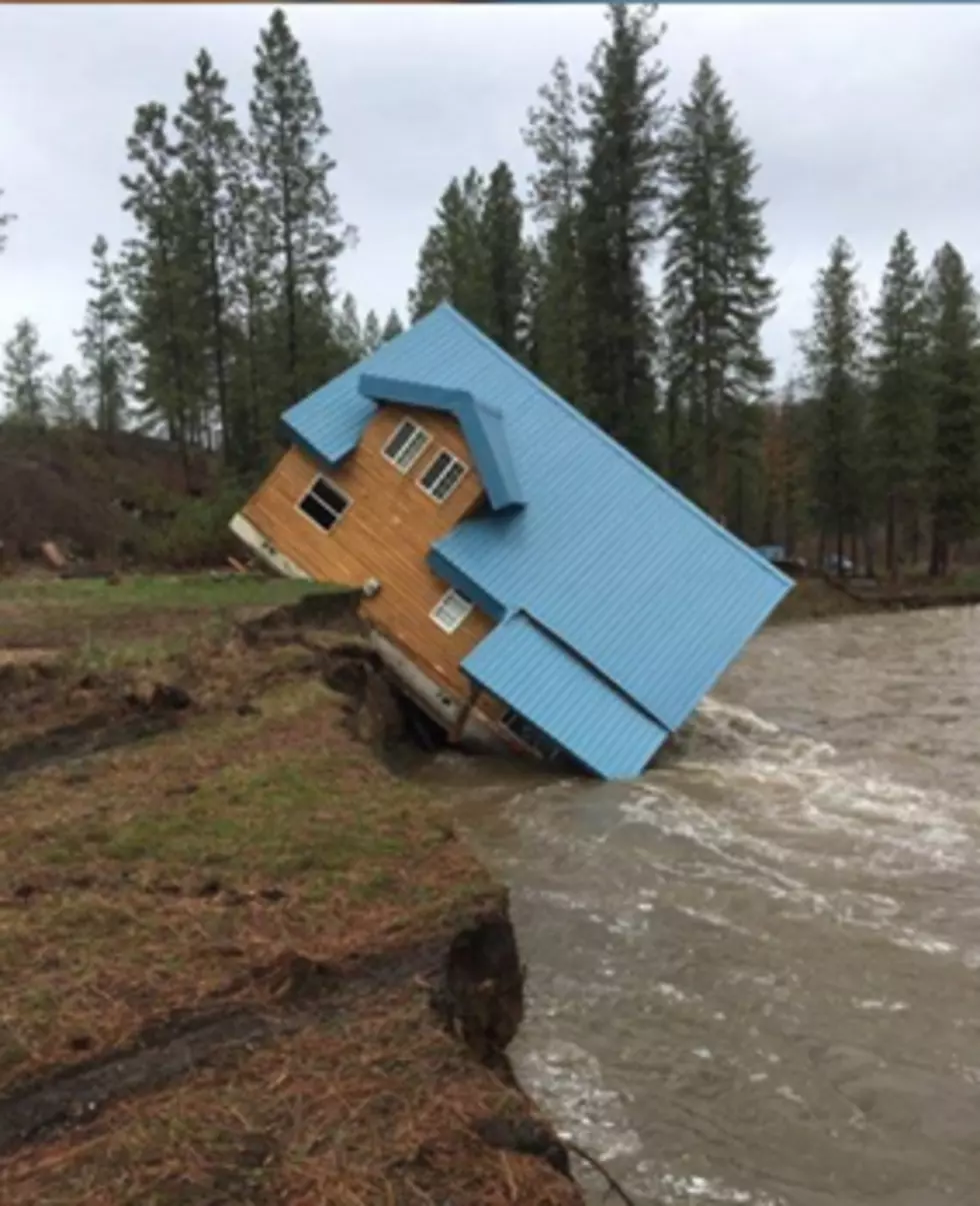 House Falls Into Rising Waters