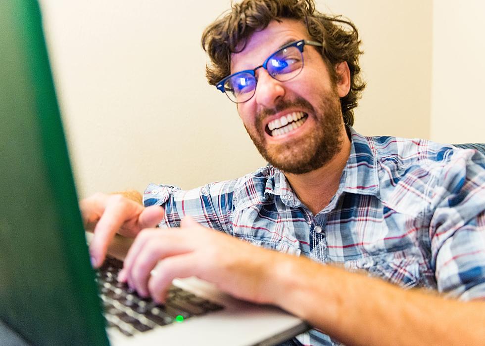 Internet Troll Is Mean At The Computer Stock Photo - Download