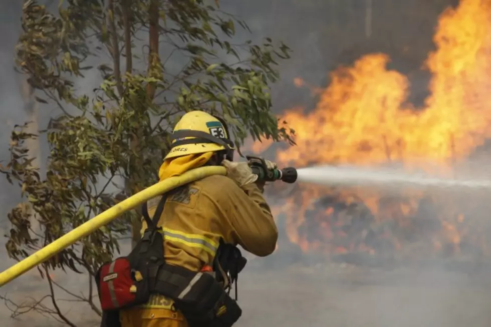 Crews Continue To Fight Largest Fire In Lower 48