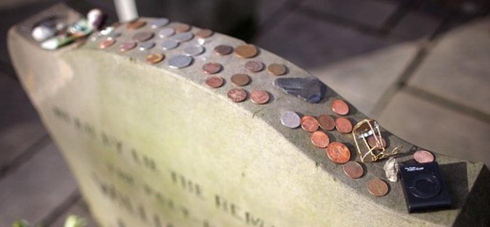 What Do The Coins Left On Military Headstones Mean?