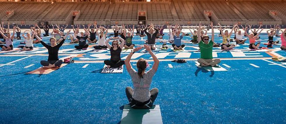 Yoga On The Blue Turf Of Boise State