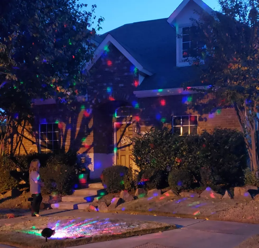 Project Christmas Lights Onto Your House and Skip Major Stress