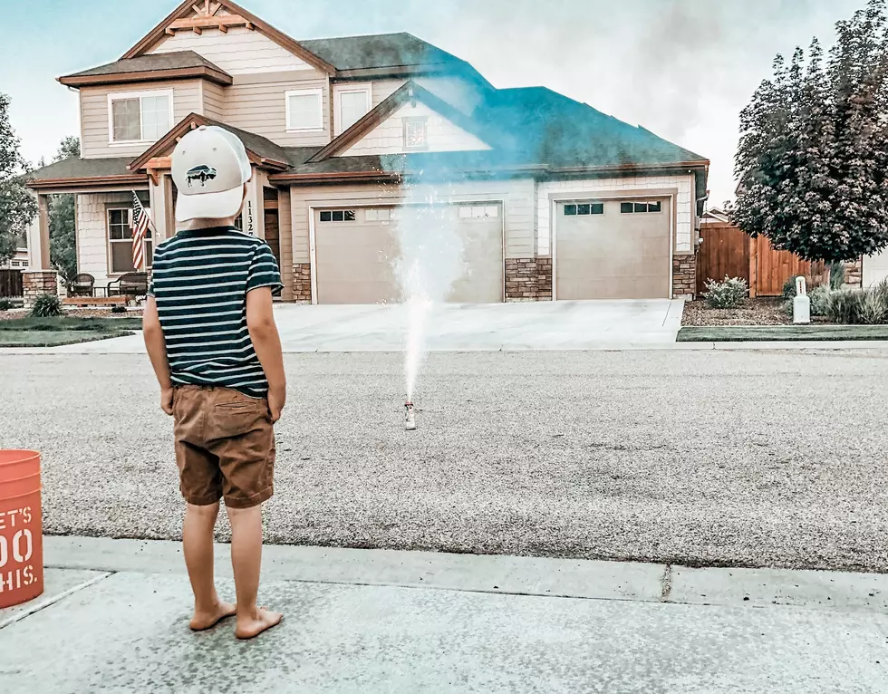 My son on an empty street Fourth of July 2020