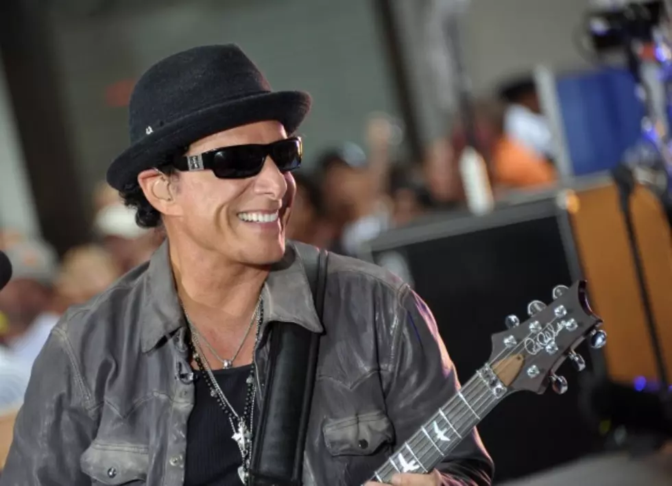 Journey Guitarist Showering New Girlfriend with Expensive Gifts?