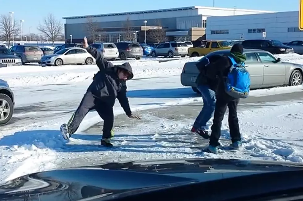 Watch School Kids Slip on an Icy Corner Over and Over for 5 Minutes Straight [VIDEO]