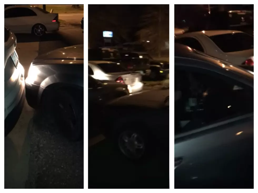 WATCH: Woman Crashes Through Multiple Cars While Leaving a Parking Lot