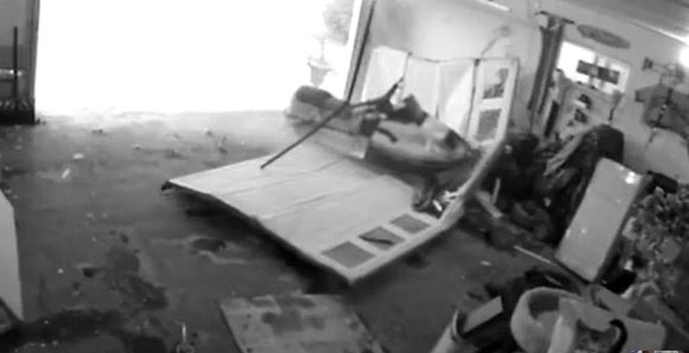 (Watch) Out Of Control Snowmobile Destroys A MN Garage Door