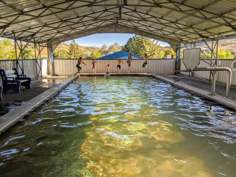 Skinny Dipper Hot Springs (5), Visitors soaking in the pool…